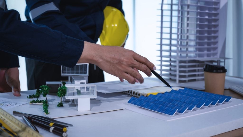 Engineer inspecting equipment in a data centre