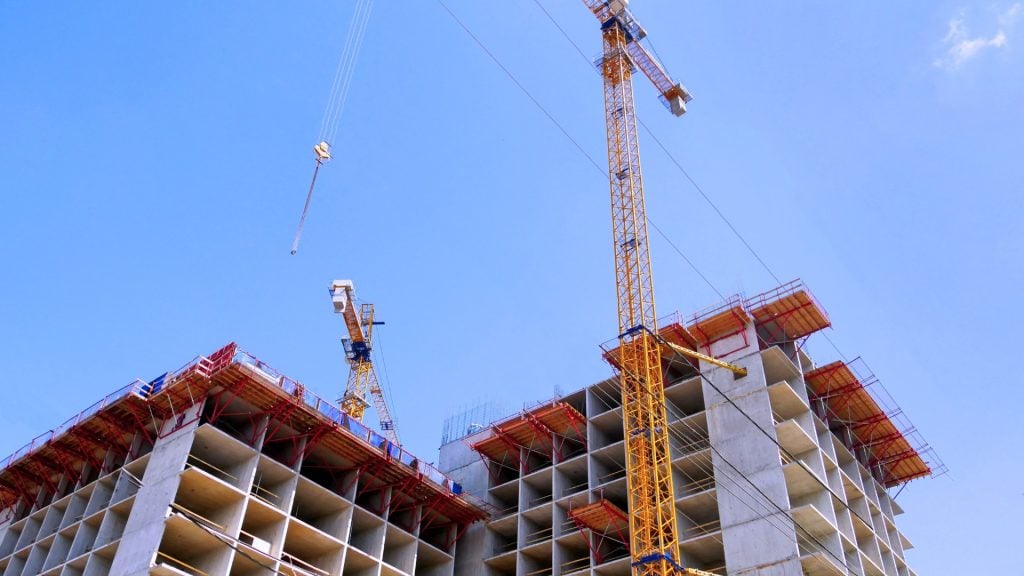 Crane lifting equipment during data centre installation